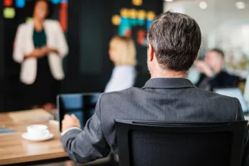 Man listening at meeting