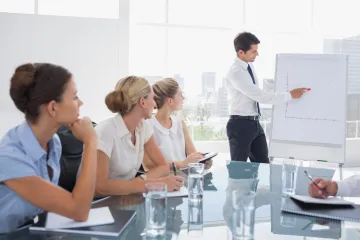 Business man presenting at a meeting