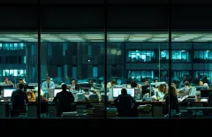 Busy office workers working at night